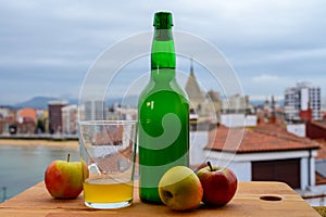 Traditional natural Asturian cider made fromÂ fermented apples in wooden barrels should be poured from great height for air